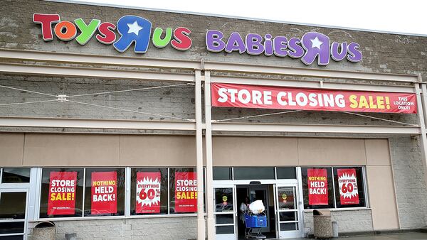 A customer leaves a Toys R Us store on March 15, 2018 in Emeryville, California. Toys R Us reportedly rejected a  $675 million bid for the stores for being too low.  (Photo by Justin Sullivan/Getty Images)