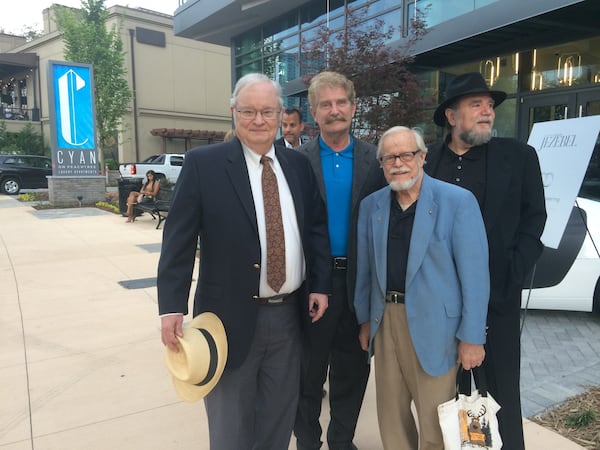 Dante Stephensen, front, with longtime Dante's Down the Hatch customer Hugh Hughes, from left, and former Dante's managers Mark Harris and Jerry Margolis. Photo: Jennifer Brett