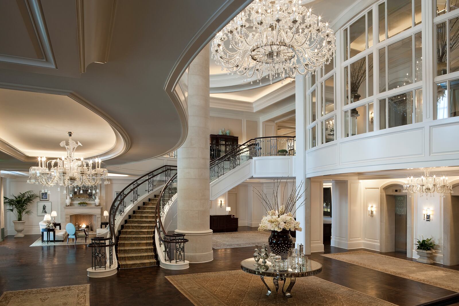 A chic lobby with sparkling chandeliers and a dramatic staircase sets the tone for a luxurious stay at the St. Regis Atlanta. CONTRIBUTED BY: St. Regis Atlanta