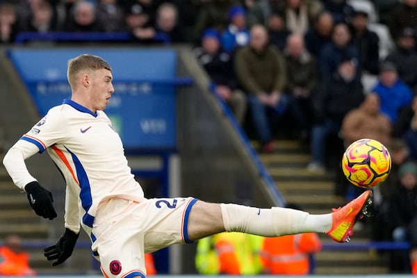 Chelsea's Cole Palmer kicks the ball during the English Premier League soccer match between Leicester City and Chelsea at King Power stadium in Leicester, England, Saturday, Nov. 23, 2024. (AP Photo/Dave Shopland)