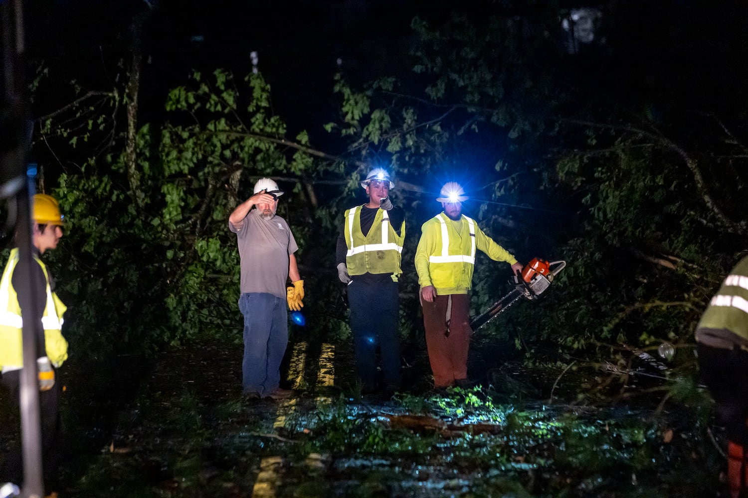 Power crews were hard at at work early Wednesday morning, April 3, 2024, dealing with severe storm damage in Rockdale County. (John Spink / John.Spink@ajc.com)