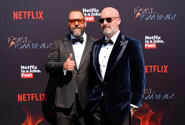 Wise guys: Bert Kreischer (left) with Todd Segura at the roast of Tom Brady in Inglewood, California, in May. Kreischer brings his Fully Loaded comedy festival to Macon on Wednesday, June 12, and Savannah on Friday, June 14.