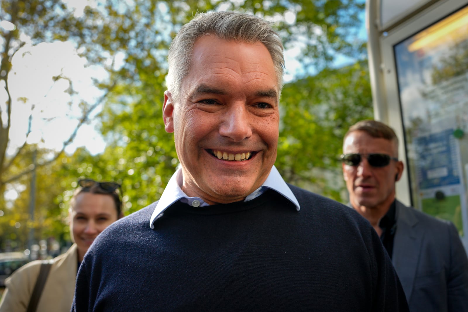 Austrian Chancellor Karl Nehammer smiles upon arriving at a polling station in Vienna, Austria, Sunday, Sept. 29, 2024, to cast his vote in the country's national election. (AP Photo/Andreea Alexandru)