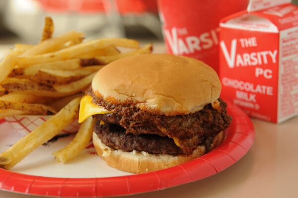 151013-ATLANTA-GA- Wendell Brock reports on the Varsity and its history of food and scene in Atlanta on Tuesday October 13, 2015. FOOD: Double chili cheese burger, fries and a Varsity PC  (chocolate milk)(Becky Stein Photography)