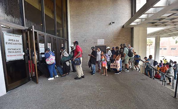 Hundreds of local residents wait in line outside the Savannah Civic Center to get a free transportation to inland shelters under mandatory evacuation ahead of Hurricane Dorian on Tuesday, September 3, 2019. Chatham Area Transit (CAT) provided free transportation to residents without private transportation to the Savannah Civic Center to assist in the mandatory evacuation of Chatham County. 