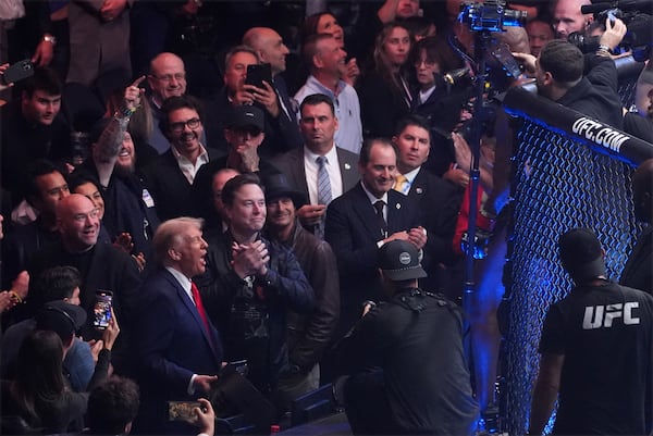 President-elect Donald Trump greets Jon Jones after he defeated Stipe Miocic at UFC 309 at Madison Square Garden, early Sunday, Nov. 17, 2024, in New York. (AP Photo/Evan Vucci)