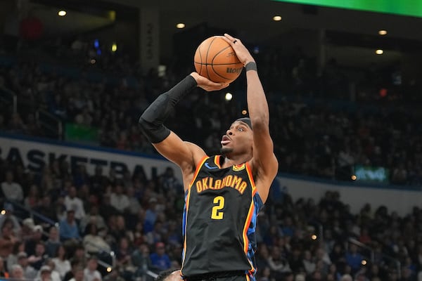 Oklahoma City Thunder guard Shai Gilgeous-Alexander shoots during the second half of an NBA basketball game against the Denver Nuggets, Sunday, March 9, 2025, in Oklahoma City. (AP Photo/Kyle Phillips)