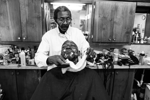 A local Atlanta man receives a shave one afternoon at Bank's Barber Shop in Atlanta, GA, photo by Antonio M. Johnson.
Courtesy of Antonio M. Johnson