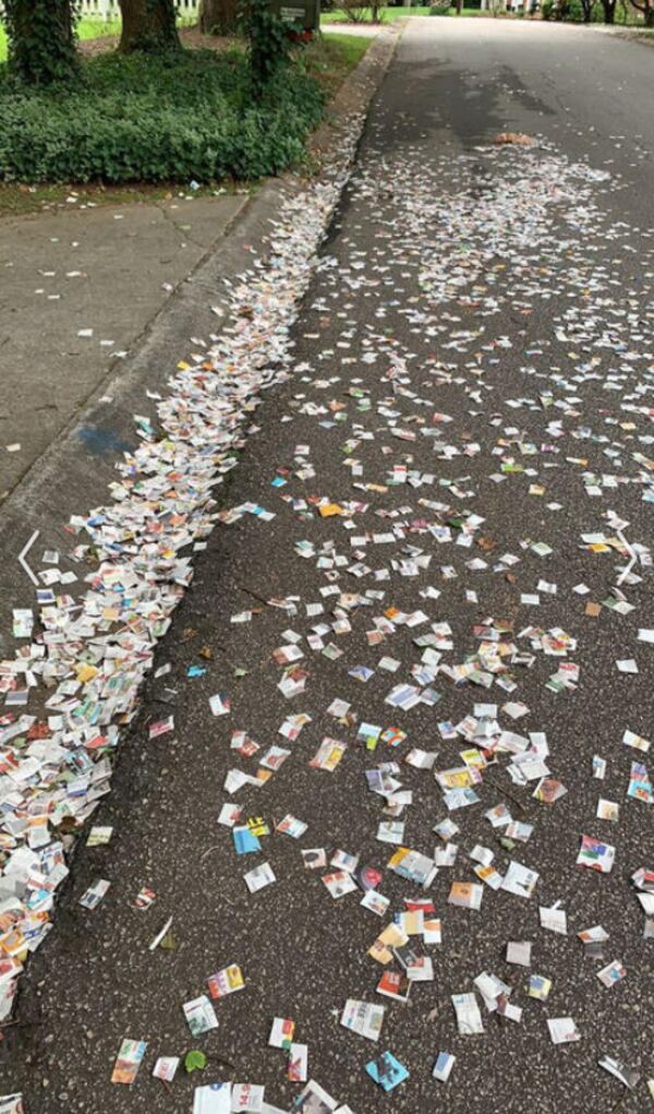 An unknown person has been chopping up inserts, stuffing them into plastic grocery bags and tossing them onto neighborhood streets and yards in the Mableton area. (Photo courtesy of Dan Colestock)