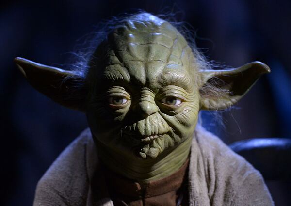 FILE PHOTO:   A wax figure of Star Wars character Yoda on display at 'Star Wars At Madame Tussauds'. (Photo by Stuart C. Wilson/Getty Images)