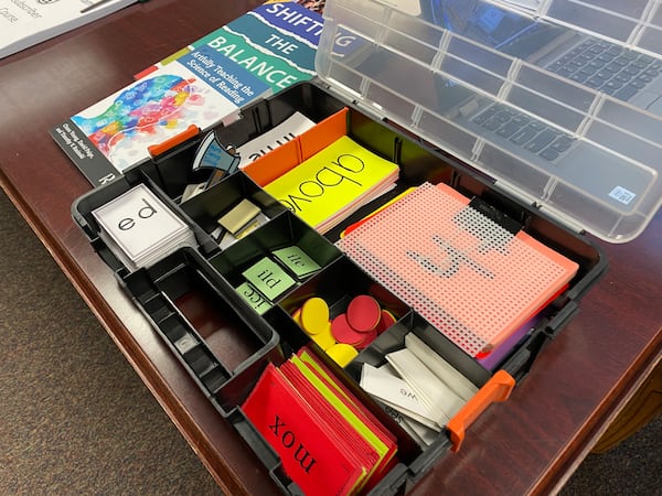 Grayson Elementary School teacher Matt Schoen created several hands-on activities that he uses to help students learning to read. He is a proponent of the science of reading, the basis of Gwinnett County Public Schools' new literacy program. (Josh Reyes / Josh.Reyes@ajc.com)