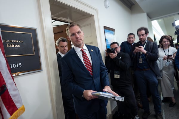 House Ethics Committee Chairman Michael Guest, R-Miss., rushes past reporters without speaking after his panel met to consider the investigation of former Rep. Matt Gaetz, R-Fla., President-elect Donald Trump's choice to be attorney general, at the Capitol in Washington, Wednesday, Nov. 20, 2024. (AP Photo/J. Scott Applewhite)