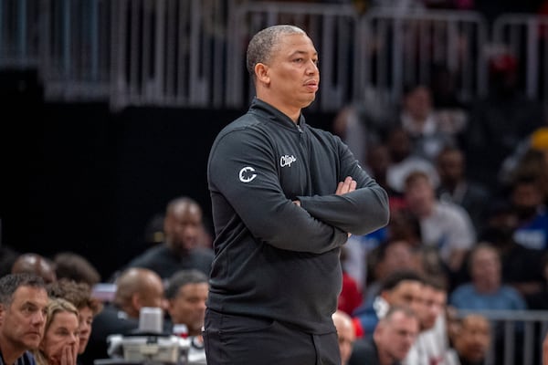 Los Angeles Clippers head coach Tyronn Lue stands on the court during the first half of an NBA basketball game against the Atlanta Hawks, Friday, March 14, 2025, in Atlanta. (AP Photo/Erik Rank)