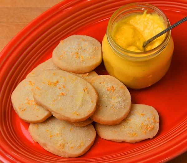 Orange-Scented Shortbread with Lemon Curd.  Styling by Jennifer Hill Booker. (CHRIS HUNT FOR THE ATLANTA JOURNAL-CONSTITUTION)