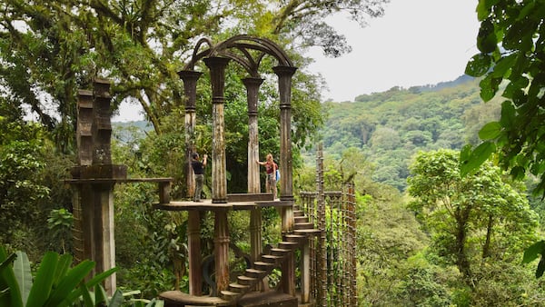 Visitors explore the surreal structures of a garden built by the late British artist Edward James. (Mark Johanson/Chicago Tribune/TNS)