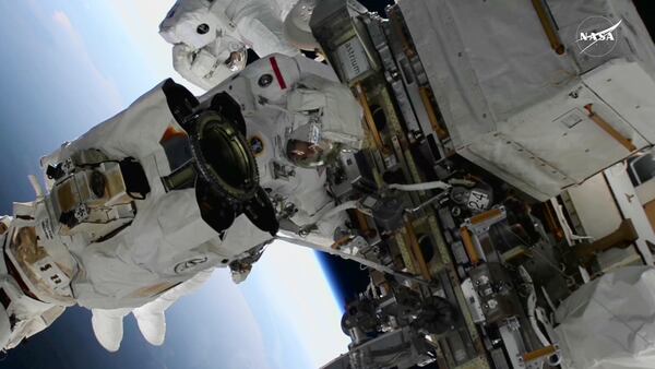 FILE - In this image from video provided by NASA, astronauts Suni Williams, foreground, and Butch Wilmore work outside the International Space Station during a spacewalk, Thursday, Jan. 30, 2025. (AP Photo/NASA TV, File)