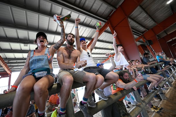 Spectators react during an exhibition match of the Midget Wrestling Warriors at the Florida Man Games, Saturday, March 1, 2025, in Elkton, Fla. (AP Photo/Phelan M. Ebenhack)