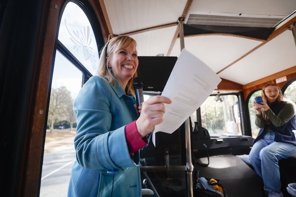 Jennifer Boettcher, communications director for the city of Dunwoody, leads a Rediscover Dunwoody Trolley Tour. (Natrice Miller/AJC)