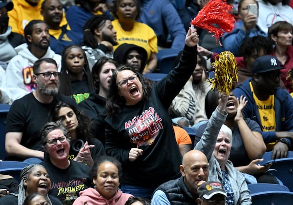 Jackson-Atlanta fans cheer at the end of the fourth quarter during GHSA Basketball Class 5A Girl’s State Championship game.