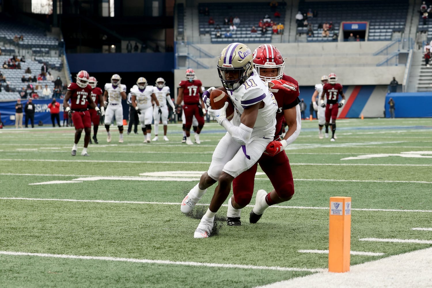 Cartersville wide receiver Devonte Ross (11) scores a touchdown during the first half against Warner Robins in the Class 5A state high school football final at Center Parc Stadium Wednesday, December 30, 2020 in Atlanta. JASON GETZ FOR THE ATLANTA JOURNAL-CONSTITUTION