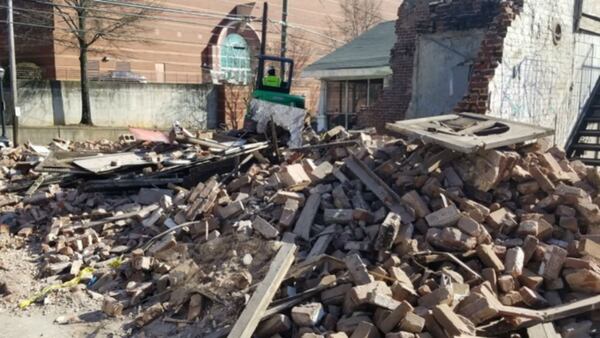 The building, that for two years housed a mural of Colin Kaepernick, was demolished this week on the even of Super Bowl LIII. (Photo: The Atlanta Journal-Constitution)