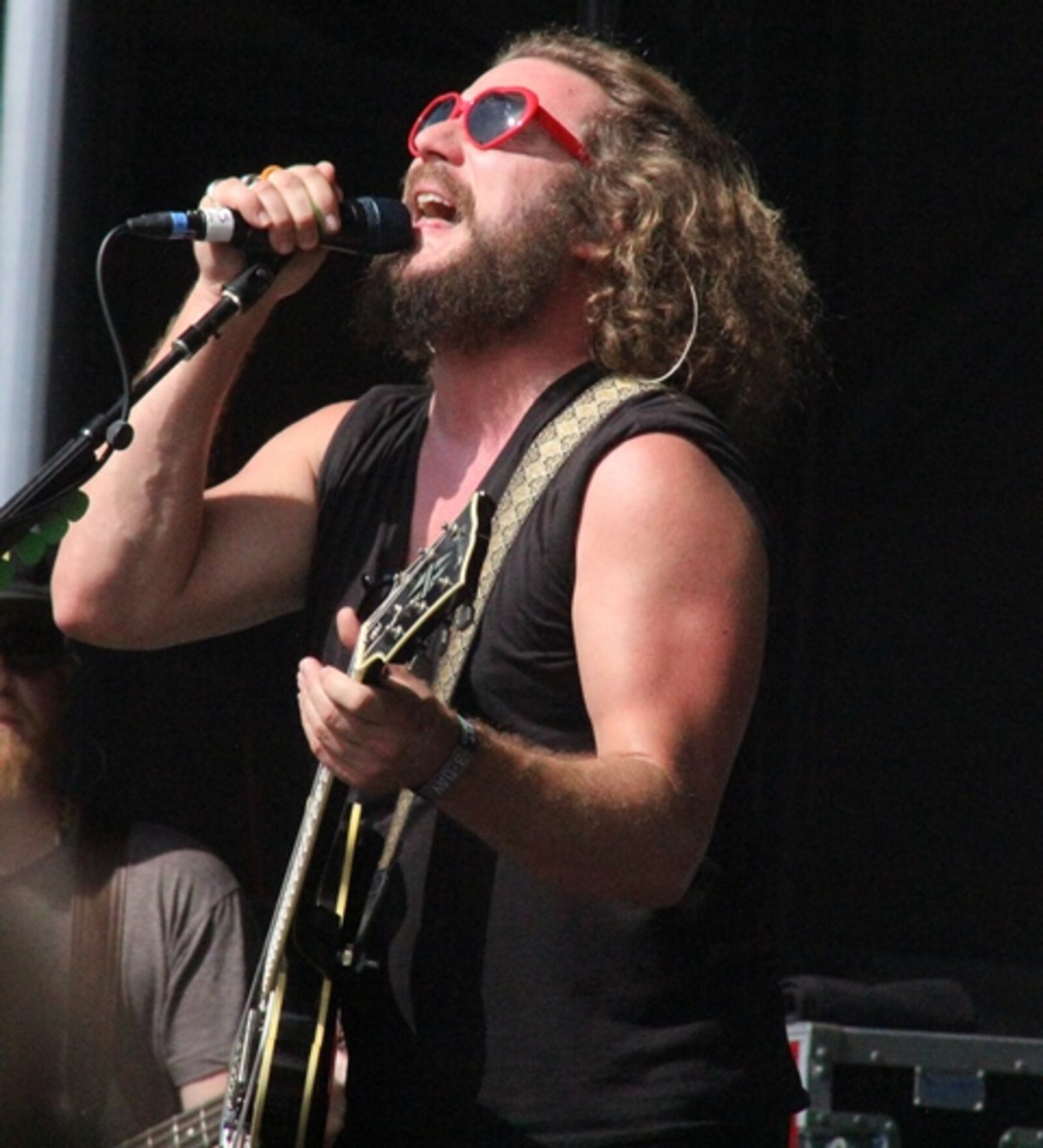 My Morning Jacket frontman Jim James rocks his special heart-shaped glasses at Shaky Knees. Photo: Melissa Ruggieri/Atlanta Journal-Constitution