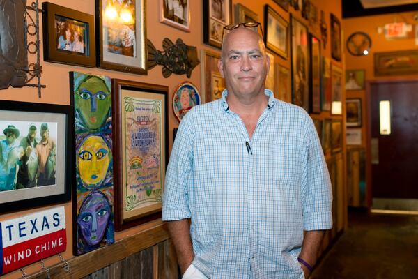  General manager Robin Vaughan among the Lone Star memorabilia at Big Tex in Decatur. Photo credit - Mia Yakel.