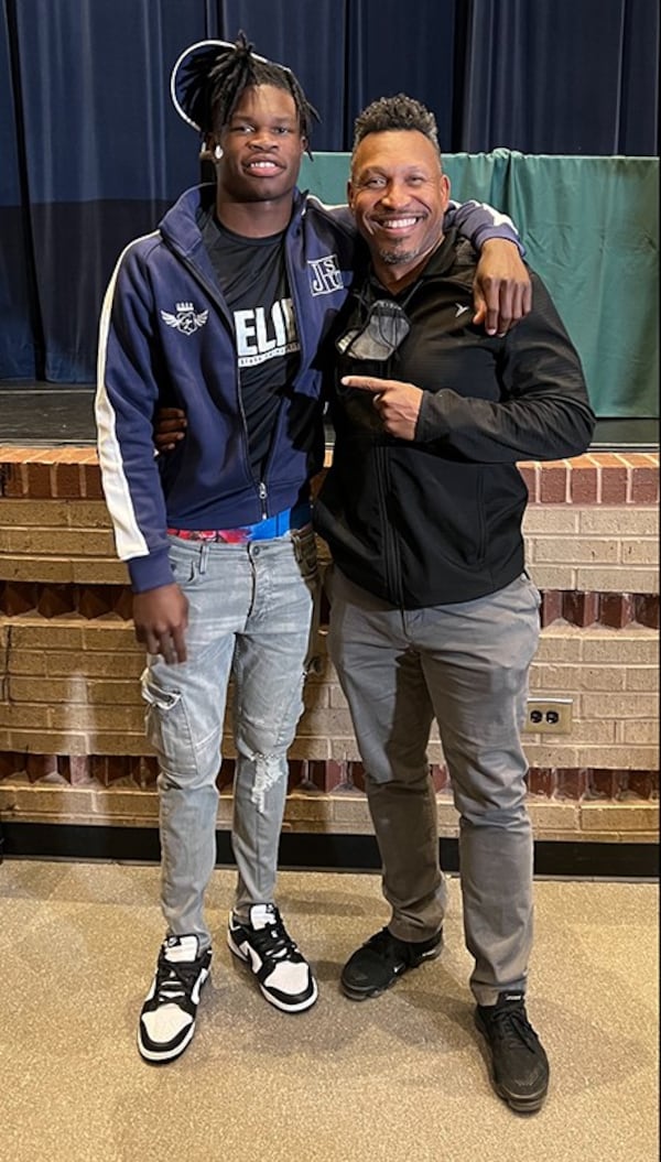 Former Collins Hill High standout Travis Hunter with Eagles assistant coach Frontia Fountain on Hunter's signing day in December 2021. Long committed to Florida State, Hunter shocked college football by announcing his signing with Jackson State. He later transferred to Colorado, following coach Deion Sanders. (Photo courtesy of Frontia Fountain)