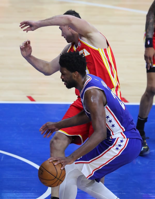 Atlanta Hawks forward Danilo Gallinari and Philadelphia 76ers center Joel Embiid collide and are both called for technical fouls.   “Curtis Compton / Curtis.Compton@ajc.com”