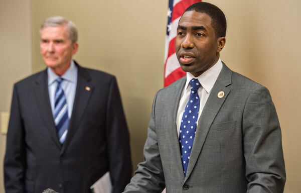 Asked during a March press conference if Mike Bowers could examine other elected officials, DeKalb interim CEO Lee May (right) said, "We are leading by example," but "we cannot force them." JONATHAN PHILLIPS / SPECIAL