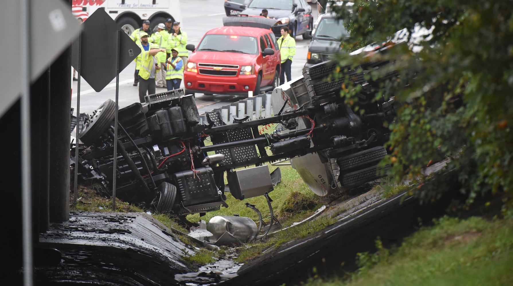 I-285 crash: Trucks plunge off interstate onto Ga. 400