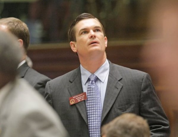 Rep. Austin Scott (R-Tifton) checks the vote tally board