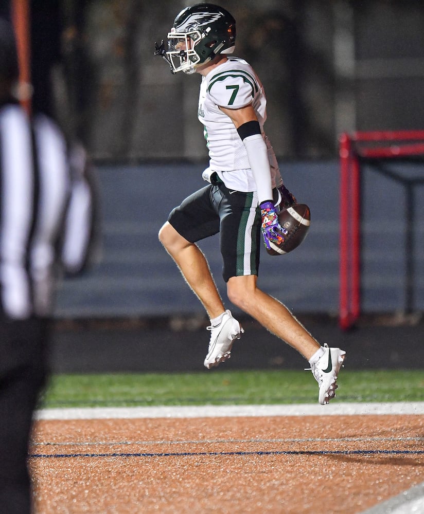 Collins Hill’s Quentin Grambo (7) celebrates his touchdown against North Cobb during the first half of play Friday, Nov. 10, 2023 at North Cobb High School. (Daniel Varnado/For the AJC)