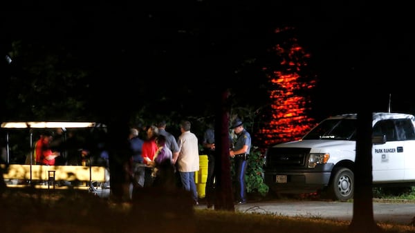 Rescue crews work at the scene of a deadly boat accident at Table Rock Lake in Branson, Mo., Thursday, July 19, 2018.