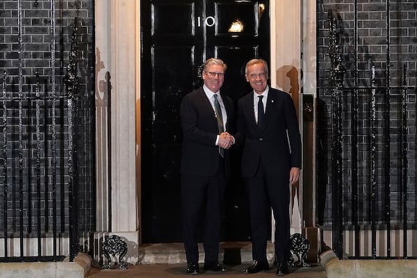 Britain's Prime Minister Keir Starmer welcomes Canada's Prime Minister Mark Carney to 10 Downing Street in London, Monday, March 17, 2025.(AP Photo/Alberto Pezzali)