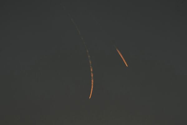 Israeli warplanes fly over Dahiyeh, in Beirut, Lebanon, Tuesday, Nov. 26, 2024. (AP Photo/Bilal Hussein)