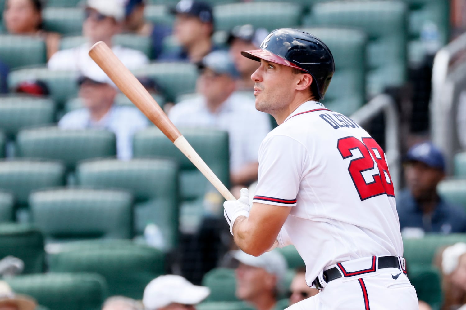 Atlanta Braves first baseman Matt Olson watches his solo home run during the eighth inning Sunday at Truist Park. (Miguel Martinez / miguel.martinezjimenez@ajc.com)