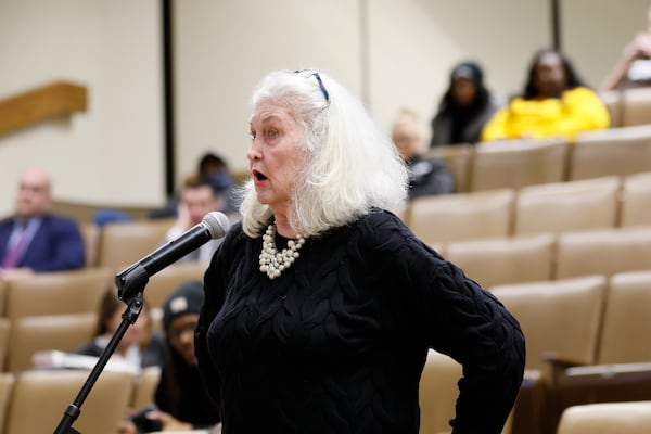 Sarah Webster speaks to the State Election Board about allegations that she brought a gun to a polling place during the 2020 election. Webster told the board during a meeting Tuesday in Macon that she saw people wearing “Black Voters Matter” T-shirts while talking to voters, passing out food and drinks, and playing hip-hop music outside the polling place. “I was completely, absolutely in horror when I pulled up to the polls to vote. ... I was totally intimidated,” Webster said. Miguel Martinez / miguel.martinezjimenez@ajc.com