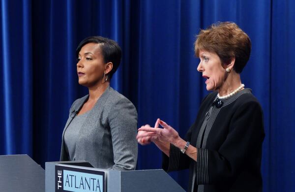 Atlanta Mayoral Candidate Mary Norwood (right) speaks as her opponent Keisha Lance Bottoms listens during the Atlanta Press Club Loudermilk-Young Debate Series. The runoff election will be held Dec. 5, 2017. HYOSUB SHIN / HSHIN@AJC.COM