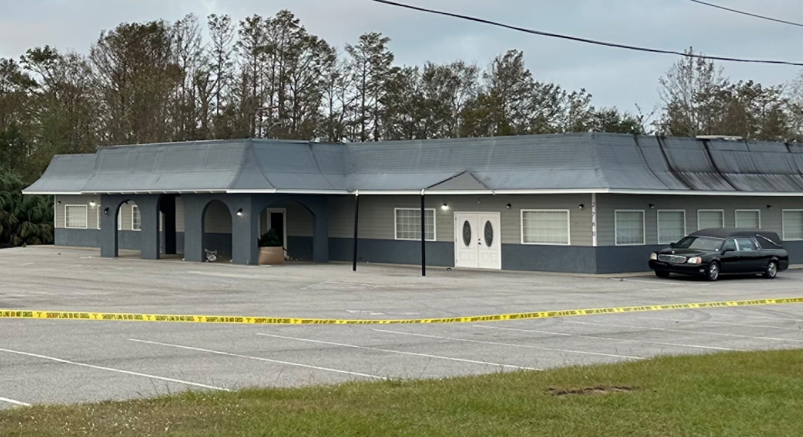 Crime tape surrounded Johnson Funeral Home in Coffee County on Monday.