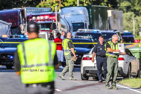 Atlanta police blocked lanes of Donald Lee Hollowell Parkway in northwest Atlanta in September after a car hit a 14-year-old boy.