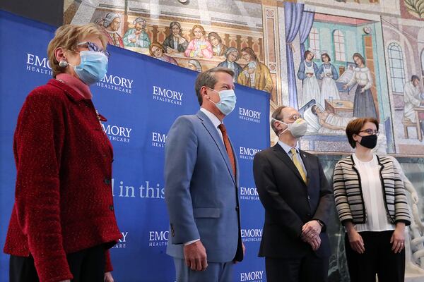 In this file photo, the Moderna vaccine rollout on Dec. 22, 2020 is discussed by DPH Commissioner Dr. Kathleen Toomey (from left); Gov. Brian Kemp; Dr. Jonathan Lewin, CEO, Emory Healthcare; and Dr. Nadine Rouphael, lead investigator for the Moderna vaccine trial.  “Curtis Compton / Curtis.Compton@ajc.com”