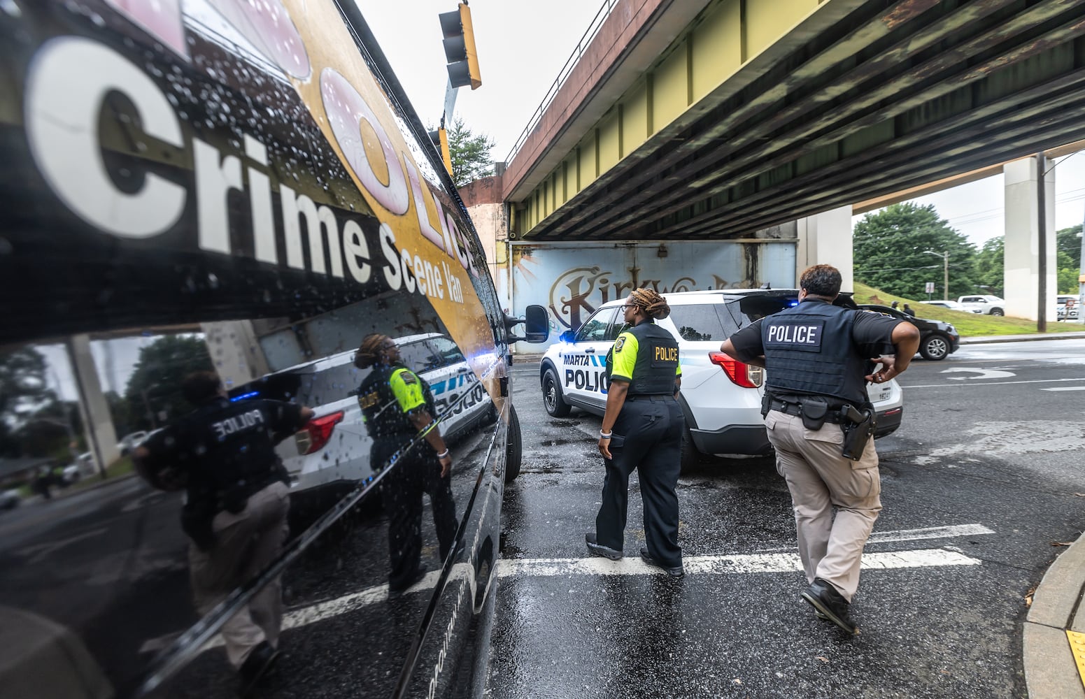 MARTA police and the Fulton County Medical Examiner’s office were on the scene of Rocky Ford Road and the MARTA train tracks investigating a death that shut down a section of track in Atlanta’s Kirkwood neighborhood after a suspected trespasser was hit and killed Thursday morning, June 6, 2024 by a westbound train. (John Spink/AJC)