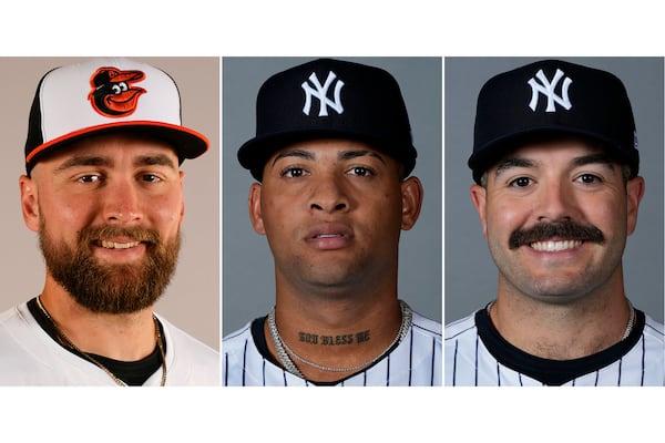 FILE - From left are baseball players, Baltimore Orioles' Colton Cowser, New York Yankees' Luis Gil and New York Yankees' Austin Wells, in 2024. (AP Photo/File)