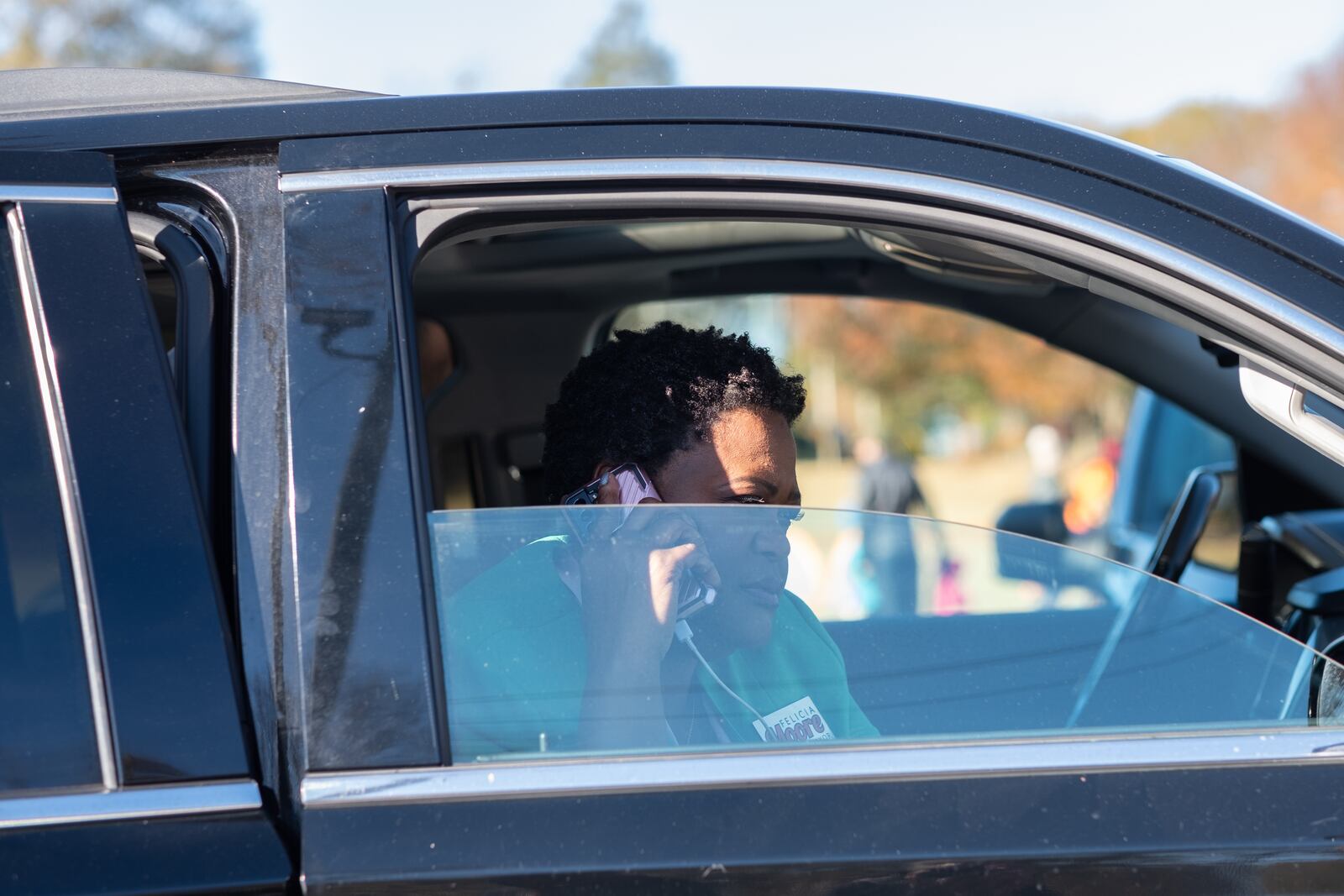 211120-Atlanta-Atlanta Mayoral candidate Felicia Moore takes a quick phone call as she arrives at a press conference in Kirkwood on Saturday morning, Nov. 20, 2021. Ben Gray for the Atlanta Journal-Constitution