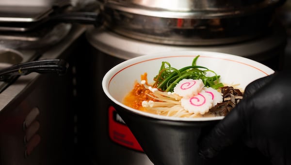 RAMEN: The Naruto Ramen at Yakitori Jinbei, chef Jae Choi incorporates three types of pork bones, chicken bones and dried fish into the broth. Toppings include cashu (braised pork belly), wood ear and enoki mushroom, spring onions and a soft-boiled egg.