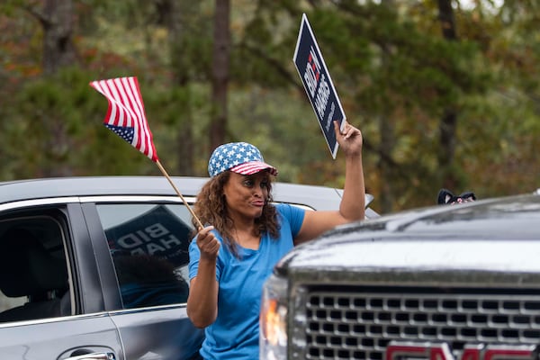 Natalie Spinks displays her support for Joe Biden's candidacy shortly before his rally at Mountain Top Inn & Resort in Warm Springs. Presidential candidates have rarely visited Georgia in recent years because Republicans had held a firm grip on it in recent years. But polls show this year that the state is up for grabs. (Alyssa Pointer / Alyssa.Pointer@ajc.com)