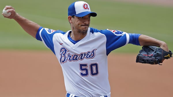 Braves pitcher Charlie Morton works against the Milwaukee Brewers during the first inning on Aug. 1 at Truist Park in Atlanta. (Ben Margot/AP)