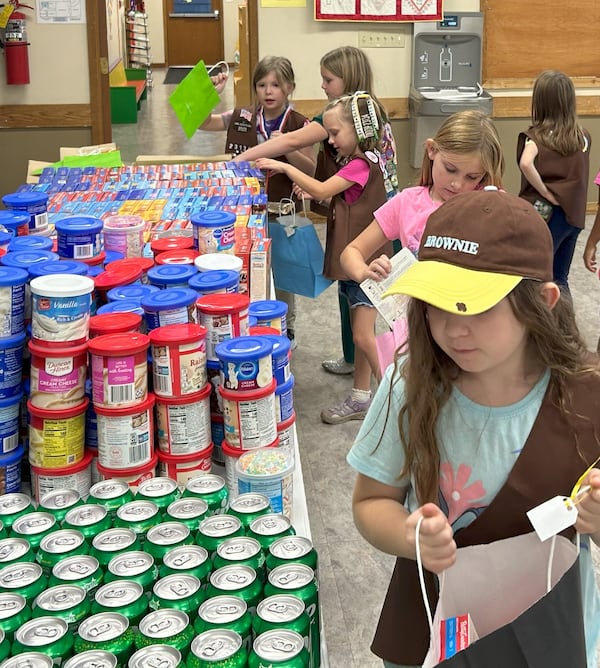 The Girl Scout Brownie troops include frosting and cake mixes so recipients can make their own birthday cakes. Photo courtesy of Girl Scout Troop 23134