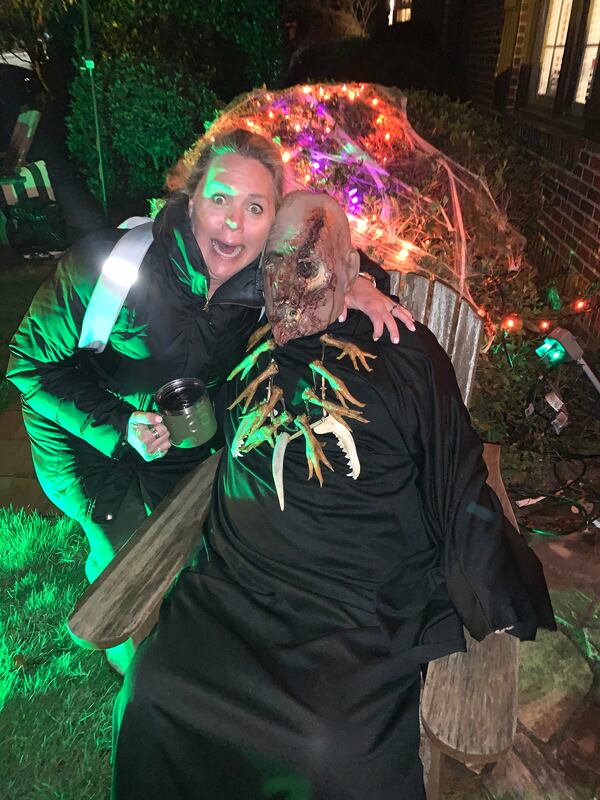 A photo of Jen Newman's father Rich Thomas dressed as a zombie in 2019 and neighbor Kristen Parker. Avondale Estates has canceled trick-or-treating, the city said in an email sent to residents Friday morning, due to health concerns. The annual event typically attracts thousands of ghosts, goblins and super heroes from neighboring areas of DeKalb County, the city said. Courtesy Jen Newman